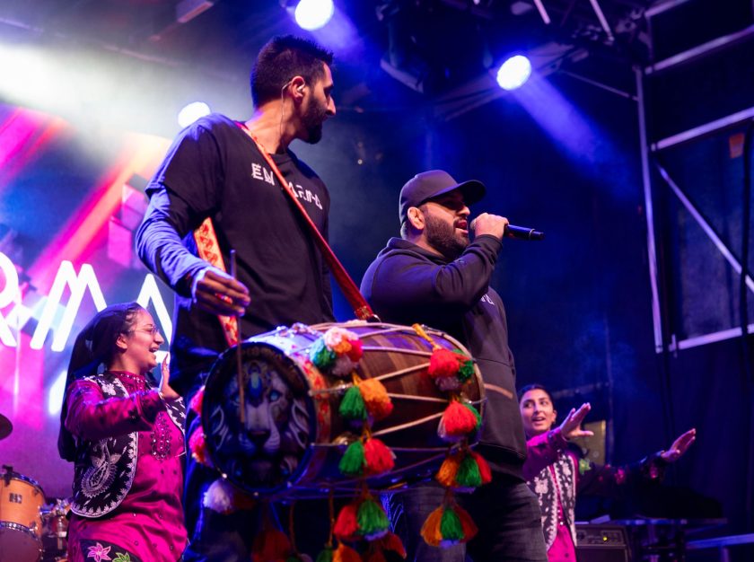A group of performers on stage at the 2024 Grey Cup Festival – clicking this link will open a larger version of it in the browser window.