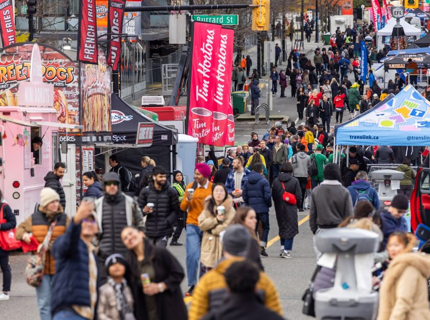 A crowd of people in the street at the 2024 Grey Cup Festival – clicking this link will open a larger version of it in the browser window.