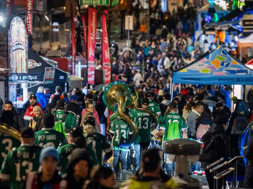 A crowd of people in the street at night for the 2024 Grey Cup Festival – clicking this link will open a larger version of it in the browser window.