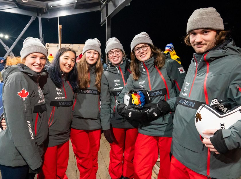 Team Canada athletes pose for a group photo at the 2023 FIL Luge World Championships – clicking this link will open a larger version of it in the browser window.